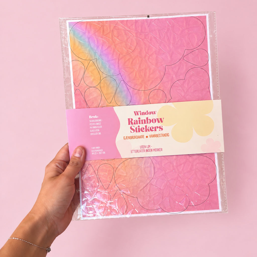 ett ark med egnbueklistremerker for vindu som skaper vakre regnbuer i hele rommet, perfekt for deg som elsker dopamindekor, girly dekor og fargerik dekor til hjemmet